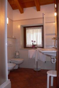 Koupelna v ubytování Albergo du Soleil