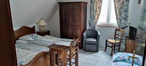 Postel nebo postele na pokoji v ubytování Chambre d'hôtes de la tulipe