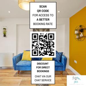 a sign in a living room with a blue couch at Sleeps 5 - Large Garden - Wifi in Kent