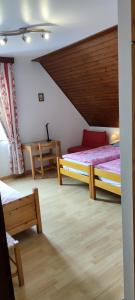 Postel nebo postele na pokoji v ubytování Chambre d'hôtes de la tulipe
