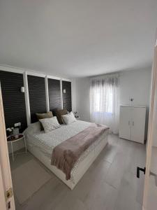 Posteľ alebo postele v izbe v ubytovaní Apartamento Casa Carmen Teguisol