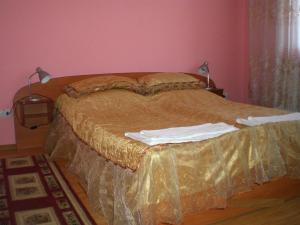 Tempat tidur dalam kamar di Smerichka