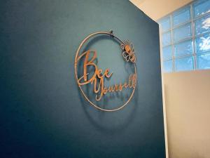 a circle sign on a wall in a room at Blaue Lagune in Vienna