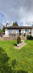 a large house with a yard with a house at Libenliny in Durbuy +35 photos