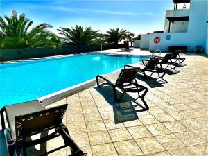 Bazén v ubytování CASA 7 SOLES nebo v jeho okolí