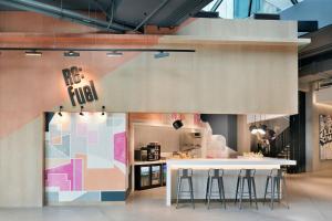 Cuisine ou kitchenette dans l'établissement Aloft Muscat