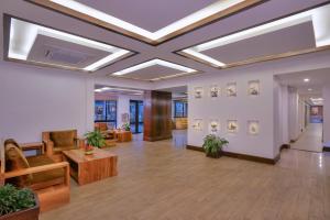 an office lobby with a coffered ceiling at Hotel Barahi Pokhara in Pokhara