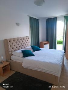 Postel nebo postele na pokoji v ubytování Marko Rooms