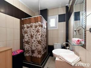 Koupelna v ubytování Villa Vangelis