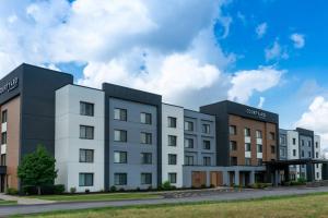 a rendering of the exterior of a building at Courtyard by Marriott Buffalo Amherst/University in Amherst