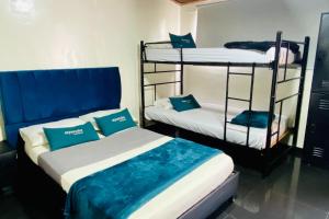 Krevet ili kreveti u jedinici u okviru objekta Hotel Bogota Home