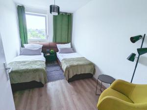 A bed or beds in a room at Schöne Wohnung mit Balkon/Parkplatz/Aufzug