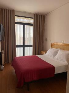 Postel nebo postele na pokoji v ubytování Hotel Mar Azul