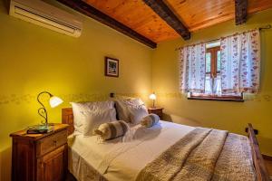 Postel nebo postele na pokoji v ubytování Villa Gora