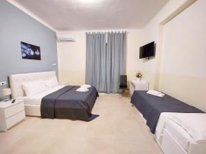 Voodi või voodid majutusasutuse Bonaini Relax B&B toas