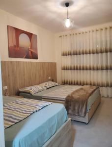 Katil atau katil-katil dalam bilik di Seascape apartment