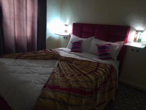 Hotel Mentaga客房内的一张或多张床位