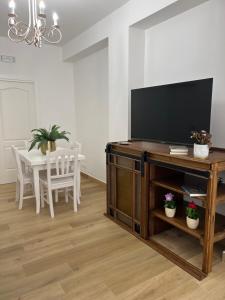 TV a/nebo společenská místnost v ubytování Caporama