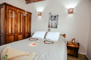 Postel nebo postele na pokoji v ubytování amzran hotel siwa + 37 fotografií