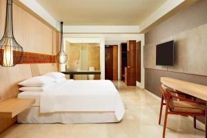 Four Points by Sheraton Bali, Ungasan客房内的一张或多张床位