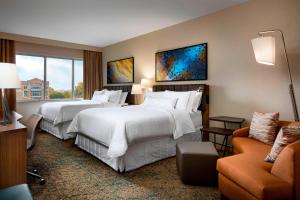 Postel nebo postele na pokoji v ubytování The Westin Buffalo
