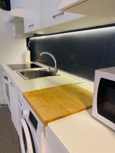 Kuchyň nebo kuchyňský kout v ubytování Apartment Rosario in Malaga center