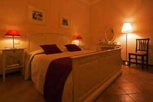 Postel nebo postele na pokoji v ubytování B&B Cortile Di Venere