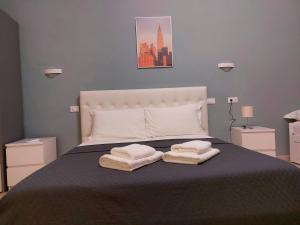 Voodi või voodid majutusasutuse Bonaini Relax B&B toas