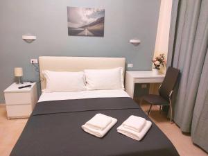 Voodi või voodid majutusasutuse Bonaini Relax B&B toas