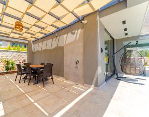 A patio or other outdoor area at Villa Kazarman, Kalkan’ın kalbinde denize, merkeze