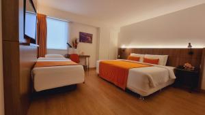 Letto o letti in una camera di Libre Hotel, BW Signature Collection by Best Western