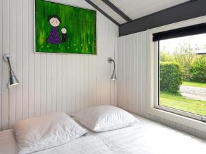 Postel nebo postele na pokoji v ubytování Holiday home Hemmet CCLXIII