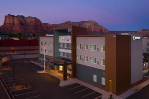 rappresentazione di un edificio con una montagna sullo sfondo di Element Sedona a Sedona