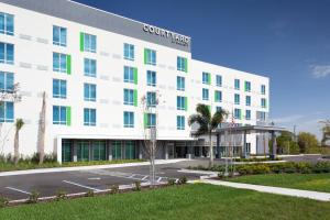 a rendering of the front of a hotel at Courtyard by Marriott Winter Haven in Winter Haven