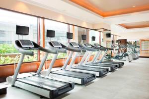 a row of cardio machines in a gym at Sheraton Imperial Kuala Lumpur Hotel in Kuala Lumpur