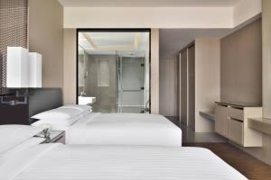 Letto o letti in una camera di Kathmandu Marriott Hotel