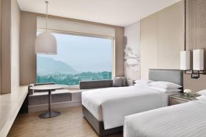 Letto o letti in una camera di Kathmandu Marriott Hotel
