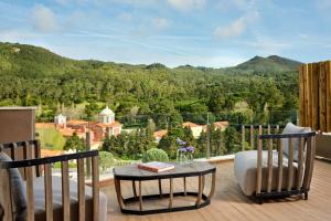 a balcony with a view of the mountains at Penha Longa Resort in Sintra