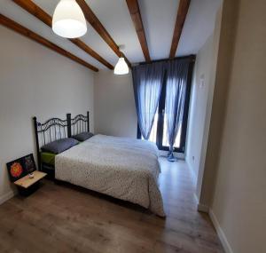 Krevet ili kreveti u jedinici u okviru objekta Preciosos apartamentos a 15 minutos de Comillas
