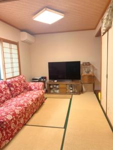 TV a/nebo společenská místnost v ubytování 柒潜の宿