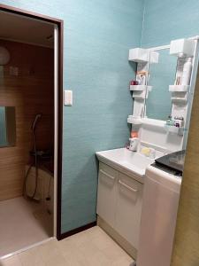 Koupelna v ubytování 柒潜の宿