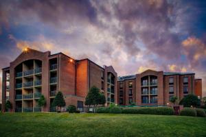 a building with a lawn in front of it at Courtyard by Marriott New Bern in New Bern