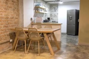 Η κουζίνα ή μικρή κουζίνα στο Ventiuna Hotel y Coliving