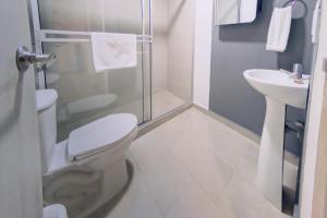 Ένα μπάνιο στο Ventiuna Hotel y Coliving