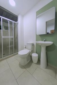 Ένα μπάνιο στο Ventiuna Hotel y Coliving