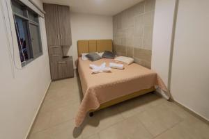 Ένα ή περισσότερα κρεβάτια σε δωμάτιο στο Ventiuna Hotel y Coliving