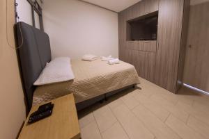 Μια τηλεόραση ή/και κέντρο ψυχαγωγίας στο Ventiuna Hotel y Coliving