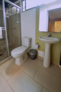 Ένα μπάνιο στο Ventiuna Hotel y Coliving
