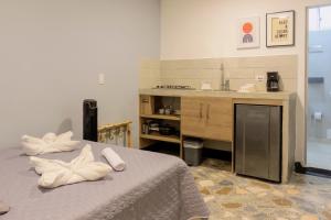Η κουζίνα ή μικρή κουζίνα στο Ventiuna Hotel y Coliving