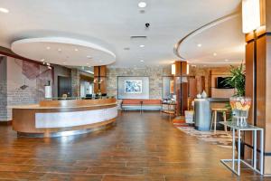 a lobby of a hotel with a reception desk at SpringHill Suites Denver at Anschutz Medical Campus in Aurora